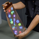 A person demonstrating the stretchability of LG's new 12-inch high-res OLED panel.